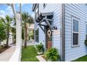 Charming entrance with a decorative wreath, enhancing the home's curb appeal and welcoming guests at 8604 Bowen Corner Ave, Hanahan, SC 29410