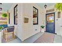 Charming front porch featuring a welcome sign, stylish decor, and covered entrance at 11 Francis St, Charleston, SC 29403