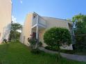 Charming two-story home with a small balcony and a well-manicured front yard at 15 Town Park Ln # A, Charleston, SC 29412