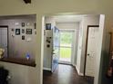 Bright foyer with hardwood floors and a blue front door at 214 Four Iron Dr, Summerville, SC 29483