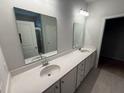 Elegant bathroom with double vanity, quartz countertops, and modern fixtures at 111 Brant Dr, Summerville, SC 29483