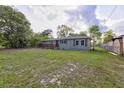 Single-story home with a large front yard at 121 Harrison St, Varnville, SC 29944