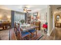 Elegant dining room featuring hardwood floors, decorative rug, and stylish accents at 127 Travis Hill Rd, Moncks Corner, SC 29461