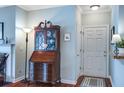 Charming foyer with hardwood floors, secretary desk, and traditional decor at 1335 Hopton Cir # 1335, Mount Pleasant, SC 29466