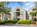 Inviting condo exterior with well-maintained landscaping and convenient parking at 1376 Pelican Watch Villas, Seabrook Island, SC 29455