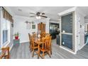Cozy dining room featuring a wooden table set, modern lighting, and stylish decor at 208 Waterford Ln, Summerville, SC 29483