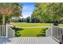 Scenic golf course view from the deck, perfect for outdoor relaxation at 4227 Sawgrass Dr, North Charleston, SC 29420