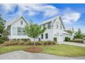 Elegant home with a two-car garage and well-maintained landscaping at 7935 Flagship Ln, Johns Island, SC 29455