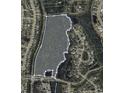 Aerial view of a wooded parcel of land with defined boundaries and surrounding neighborhood at 0 Faulkner Dr, Mount Pleasant, SC 29466