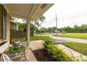 Cozy front porch features comfortable seating and manicured landscaping, offering a relaxing outdoor space at 1010 Fiall St, Charleston, SC 29407