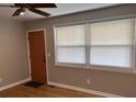 Light-filled living room featuring hardwood floors, neutral walls, and a window with bright natural light at 105 Pandora Dr, Goose Creek, SC 29445