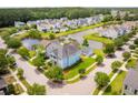 Aerial view of the community with waterfront homes, lush landscaping, and winding streets at 1446 Crane Creek Dr, Mount Pleasant, SC 29466