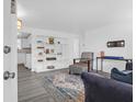 Bright living room featuring fresh white walls, hardwood floors, and stylish furnishings at 1514 Patterson Ave, Charleston, SC 29412