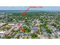 Aerial view of homes near Hampton Park in Charleston, South Carolina with lush greenery, and city views at 200 Fishburne St, Charleston, SC 29403