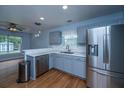 Spacious kitchen boasts stainless steel refrigerator and ample countertop space for meal preparation at 1005 Trotters Blvd, Summerville, SC 29483