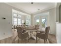 Elegant dining area with seating for six, perfect for Gathering dinners and entertaining guests at 130 River Landing Dr # 2310, Daniel Island, SC 29492