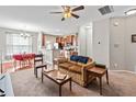 Open-concept layout with the living room flowing into the dining and kitchen areas at 2488 Stadium Dr, North Charleston, SC 29406