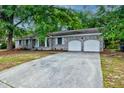Charming brick home with a two-car garage and driveway at 5322 Chantilly Ln, North Charleston, SC 29418