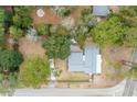Aerial view of property highlighting the well-maintained yard, home, and a mobile home at 907 Pauline Ave, Charleston, SC 29412