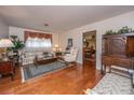 Cozy living room with hardwood floors and classic furnishings, illuminated by natural light at 930 Stiles Dr, Charleston, SC 29412