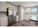 Bright kitchen featuring stainless steel appliances, including a modern refrigerator, and sleek cabinetry at 108 Swanson Dr, Summerville, SC 29483