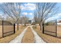 Gated driveway leading up to home at 117 Ponderosa Rd, Summerville, SC 29483