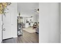 Inviting entryway featuring hardwood floors and open access to the kitchen and living room at 165 Clydesdale Cir, Summerville, SC 29486