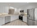 Updated kitchen with white cabinets and stainless steel appliances at 321 Lapwing Ln, Mount Pleasant, SC 29464