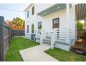 Front yard with a well manicured lawn, and view of the home's front entrance at 42 Poinsett St # B, Charleston, SC 29403