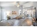 Spacious living room with vaulted ceilings, modern ceiling fan, and comfortable seating area at 512 Castle Hall Rd, Mount Pleasant, SC 29464