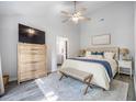Bright main bedroom with a king bed, walk in closet, and an en-suite bathroom at 512 Castle Hall Rd, Mount Pleasant, SC 29464