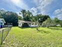 Charming single-story home surrounded by a well-kept lawn and mature trees, offering a serene setting at 524 Kell Pl, Charleston, SC 29412