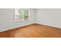 Sunlit bedroom with hardwood floors and a bright window view at 1240 Fairmont Ave # 22, Mount Pleasant, SC 29464