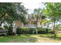 Beautiful exterior showcasing a two-story home with a welcoming front porch and well-maintained greenery at 1648 Secessionville Rd, Charleston, SC 29412