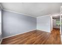 Bright, spacious living room with hardwood floors and fresh paint at 2045 Rondo St # B, Charleston, SC 29414