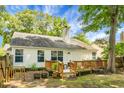 The home features a wooden deck, perfect for outdoor entertaining and relaxation at 2701 Four Winds Pl, Mount Pleasant, SC 29466