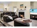 Cozy living room features a fireplace and comfortable seating at 2701 Four Winds Pl, Mount Pleasant, SC 29466