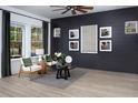 Stylish living room with natural light, modern decor, neutral color palette, and a comfortable seating area at 330 Trailmore Ln, Summerville, SC 29486