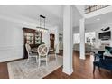 Elegant dining room featuring hardwood floors, stylish furniture, and ample natural light at 1003 Jervey Point Rd, Wando, SC 29492