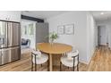 Breakfast nook featuring modern lighting and stainless steel refrigerator at 1320 Bresee St, Charleston, SC 29412