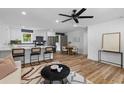 Bright open floor plan with a modern kitchen, dining area and cozy living room at 1320 Bresee St, Charleston, SC 29412