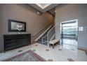 Elegant lobby with tiled floors, stairs, elevator, and stylish decor creating a welcoming atmosphere at 145 Pier View St # 214, Daniel Island, SC 29492