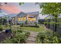Lush backyard garden with an inviting patio setup perfect for outdoor relaxation and entertaining at 148 Longdale Dr, Summerville, SC 29483