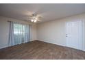 Living room with wood-look floors, neutral walls, and a ceiling fan at 2011 N Highway 17 # 1400B, Mount Pleasant, SC 29466