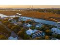 Scenic aerial view of waterfront homes, marshlands, and a bridge at 222 Haddrell St, Mount Pleasant, SC 29464