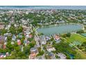 Stunning aerial view of Charleston with a view of Colonial Lake and the surrounding historic homes and lush greenery at 55 Ashley Ave # 6, Charleston, SC 29401