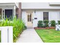 Charming home exterior with a well-manicured lawn and inviting entryway at 705 Williamson Dr # C, Mount Pleasant, SC 29464