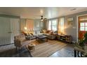 Cozy living room with ample seating, natural light, and stylish decor at 716 White Oak Dr, Charleston, SC 29407