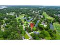 Breathtaking aerial view showcasing a golf course and a tranquil waterfront community at 919 Overview Ct, Mount Pleasant, SC 29464