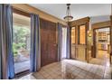 Foyer with tile flooring, natural light and built in shelving at 103 Kenninghall Rd, Goose Creek, SC 29445